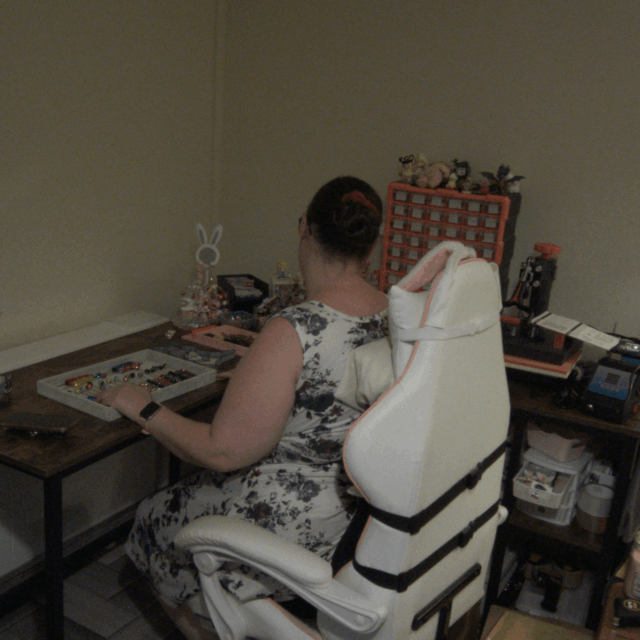 Emma at her workbench making beaded jewellery