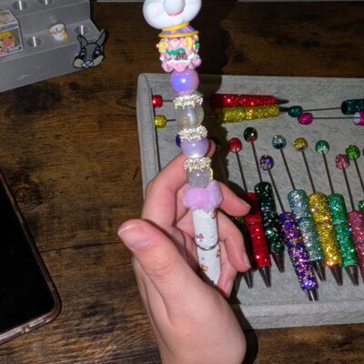 Close-up of a handmade beaded pen