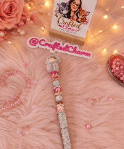 Cosy doll figure in a bunny outfit pen
