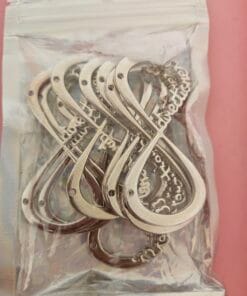 9x Metal charms with "Directioners" written on it