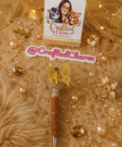 Golden homemade butterfly bead pen