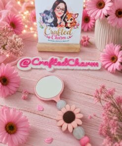 Pink daisy handheld mirror